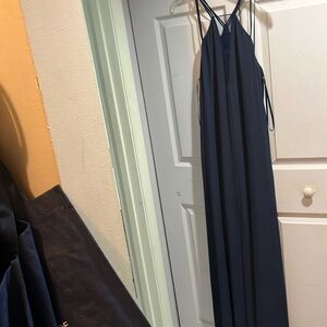 Long blue BCBG Maxazria maxi dress with split in fron and spaghetti straps.